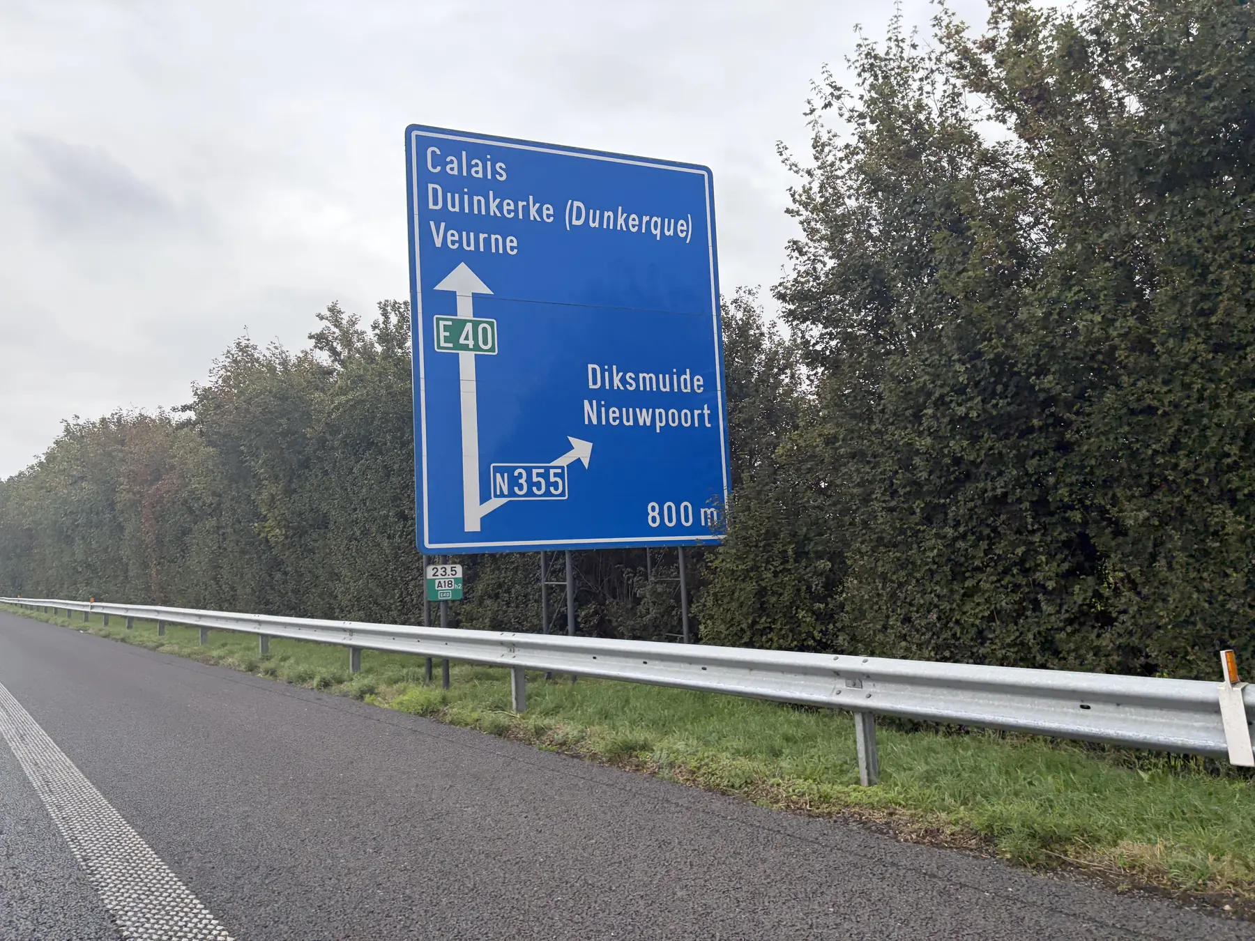 Road sign on the E40 for Calais, Duinkerke and Veurne