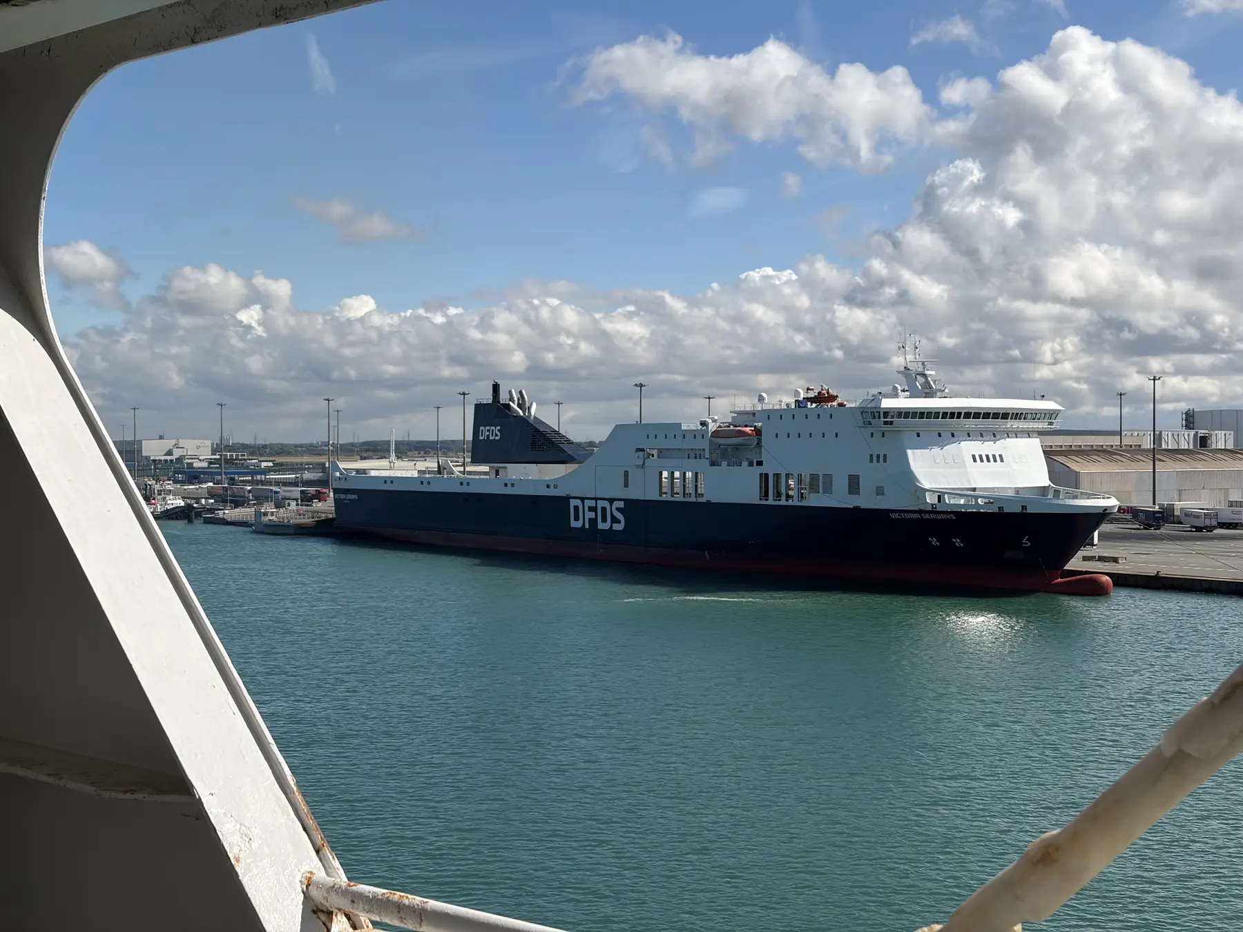 DFDS freight ferry at the quay in Dunkirk port, seen from the car