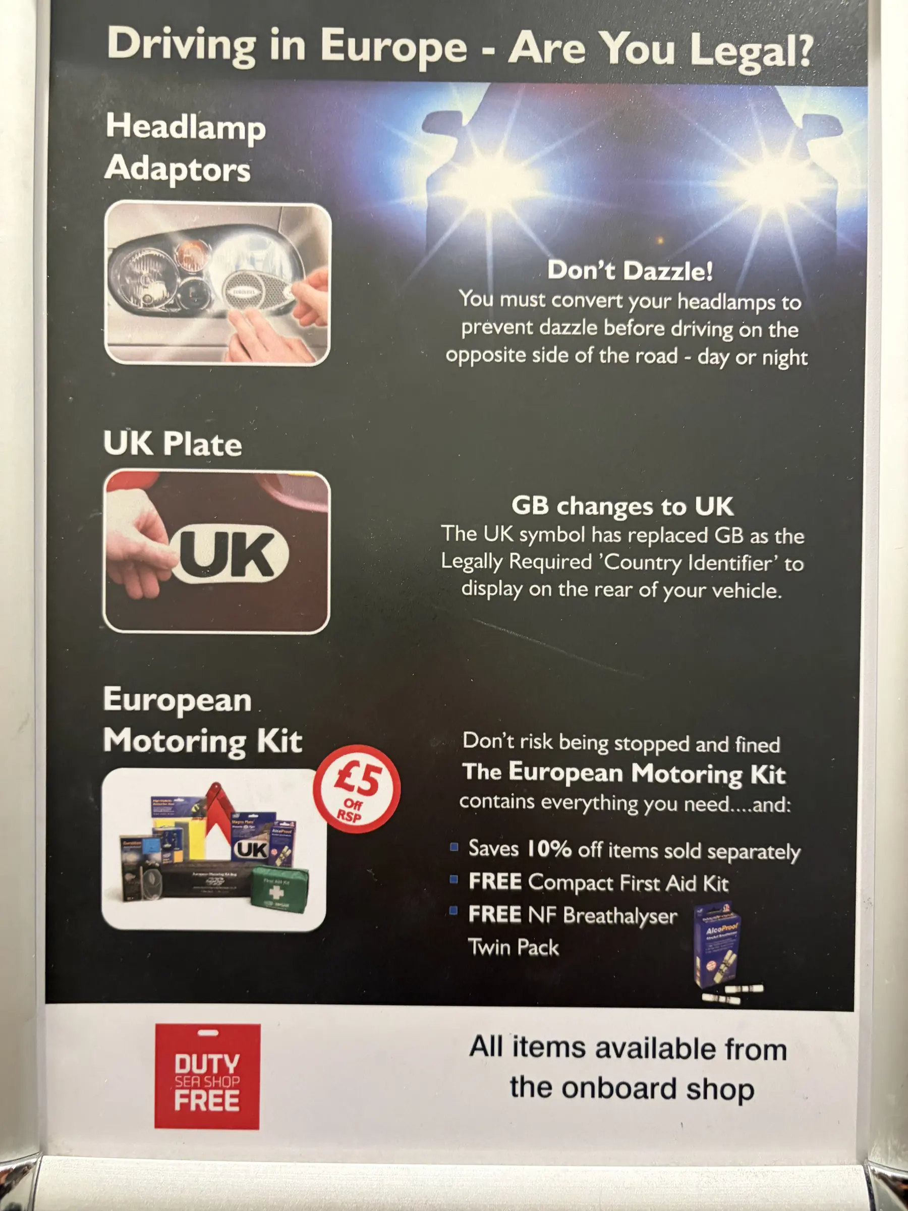 Poster on board about the UK sticker and the kit required in France