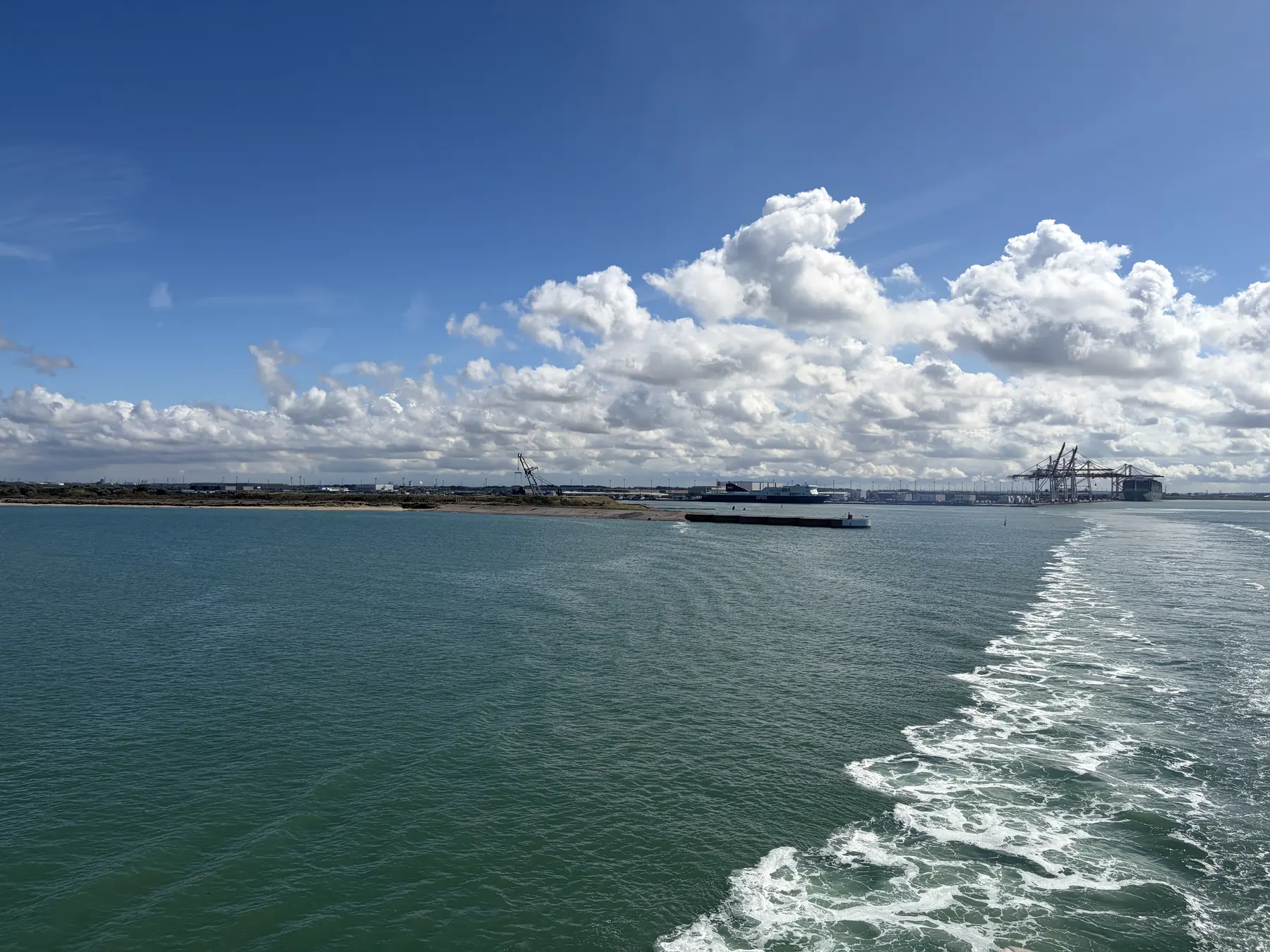 The ferry's wake leaving Dunkirk harbour
